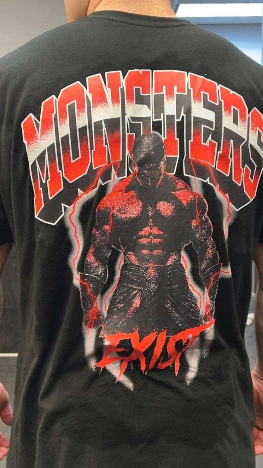 Monsters Exist tee